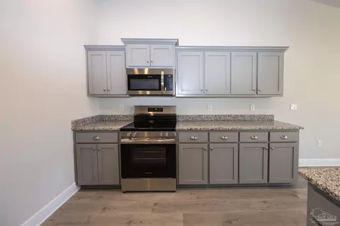 Kitchen - 6220 Pineapple Dr, Milton, FL 32570 photo 2 of 3