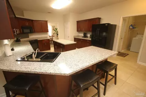 Kitchen - 5895 Quintette Rd, Pace, FL 32571 photo 2 of 7