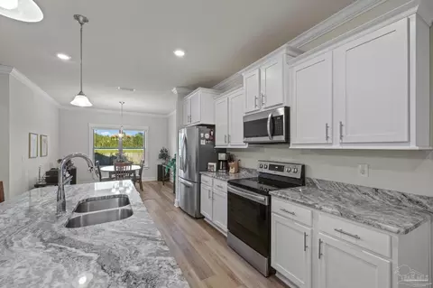 Kitchen - 6131 Cherry Hill Cir, Pace, FL 32571 photo 3 of 3