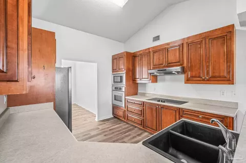 Kitchen - 4797 Oscar Ln, Pace, FL 32571 photo 3 of 5