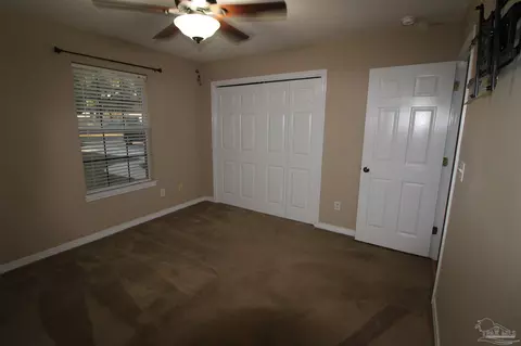 Bedroom - 5501 Riviera Dr, Milton, FL 32583 photo 4 of 4