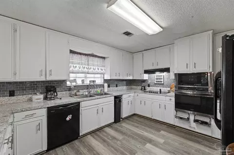 Kitchen - 2593 Segrest Rd, Pace, FL 32571 photo 3 of 6
