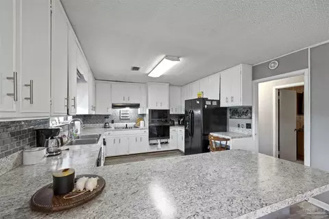 Kitchen - 2593 Segrest Rd, Pace, FL 32571 photo 2 of 6