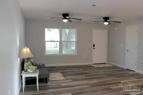 Living - 4448 Pine Villa Cir, Pace, FL 32571 photo 2 of 2