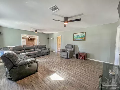 Living - 6668 Maple St, Milton, FL 32570 photo 2 of 3