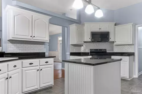 Kitchen - 5669 Als Way, Milton, FL 32583 photo 3 of 4