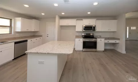 Kitchen - 6179 Pineapple Dr, Milton, FL 32570 photo 2 of 3