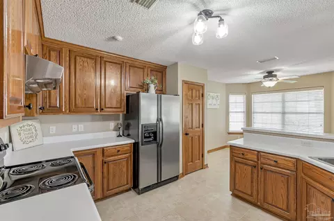 Kitchen - 602 Pinebrook Cir, Cantonment, FL 32533 photo 3 of 4