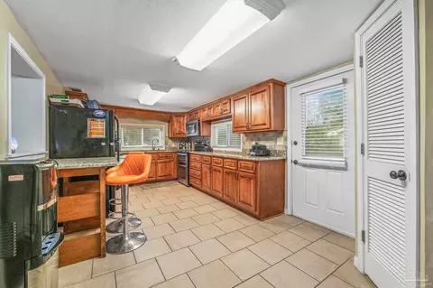 Kitchen - 751 Archer Rd, Cantonment, FL 32533 photo 2 of 2