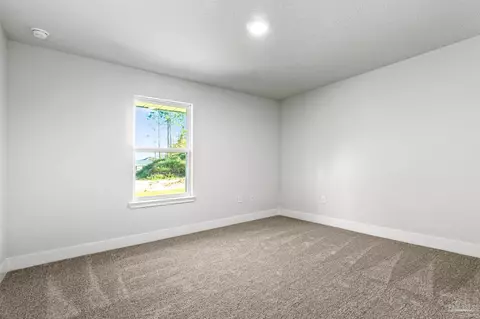 Bedroom - 192 Cedar Tree Ln #52B, Cantonment, FL 32533 photo 2 of 4
