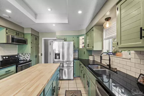 Kitchen - 5180 Rowe Trl, Pace, FL 32571 photo 7 of 7