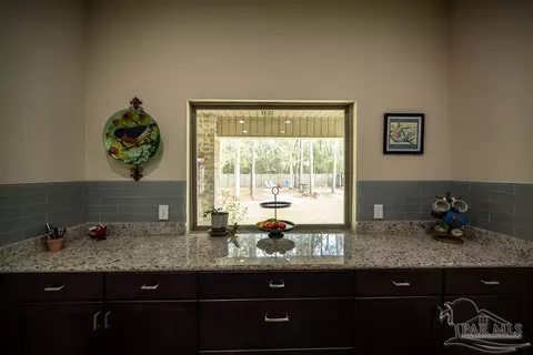 Kitchen - 5994 Augustine Dr, Pace, FL 32571 photo 3 of 4