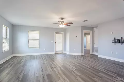 Living - 5857 Pescara Dr, Pace, FL 32571 photo 2 of 4