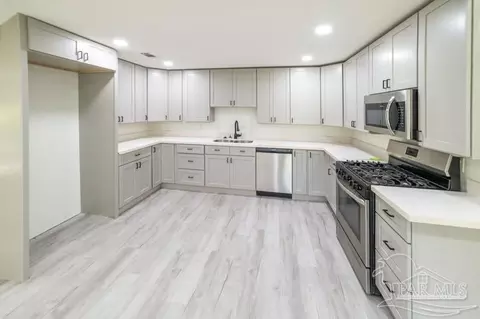 Kitchen - 2910 Pine Forest Rd, Cantonment, FL 32533 photo 1 of 5