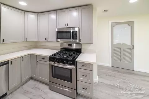 Kitchen - 2910 Pine Forest Rd, Cantonment, FL 32533 photo 4 of 5