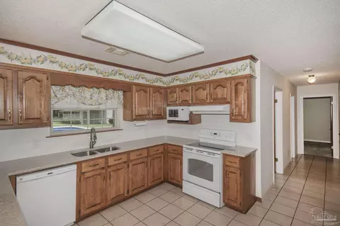 Kitchen - 3918 Wiley Penton Rd, Pace, FL 32571 photo 1 of 5