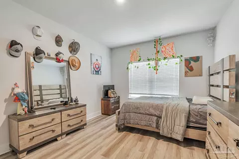 Bedroom - 7604 Dewey Jernigan Rd, Pace, FL 32571 photo 4 of 7