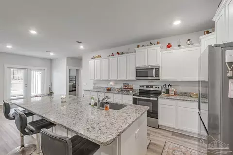 Kitchen - 7604 Dewey Jernigan Rd, Pace, FL 32571 photo 5 of 6