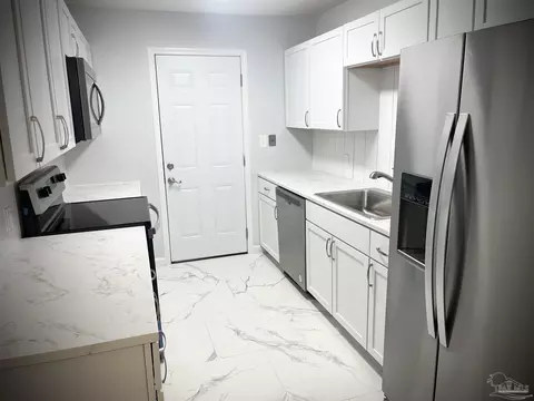 Kitchen - 5399 Locklin Ave, Milton, FL 32570 photo 1 of 3