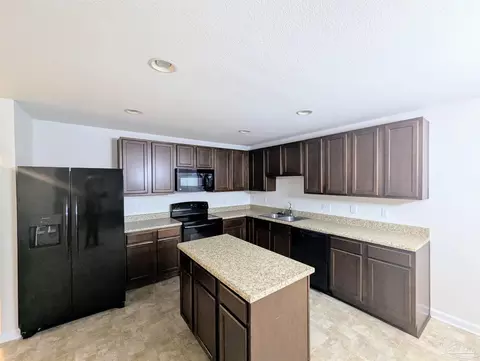 Kitchen - 3963 Tuscany Way, Pace, FL 32571 photo 2 of 3