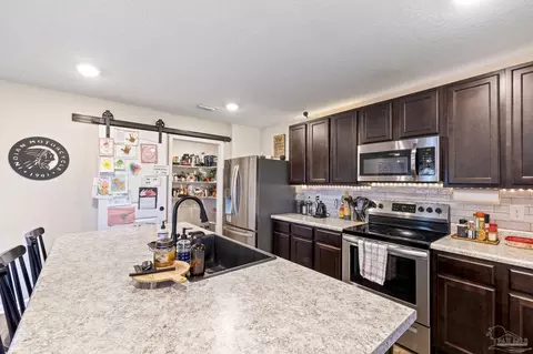 Kitchen - 4678 Perception Cir, Milton, FL 32570 photo 4 of 4