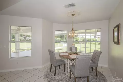 Dining - 3221 Cobblestone Dr, Pace, FL 32571 photo 2 of 3