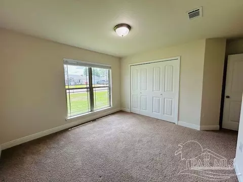 Bedroom - 5643 Flume Dr, Pace, FL 32571 photo 5 of 6