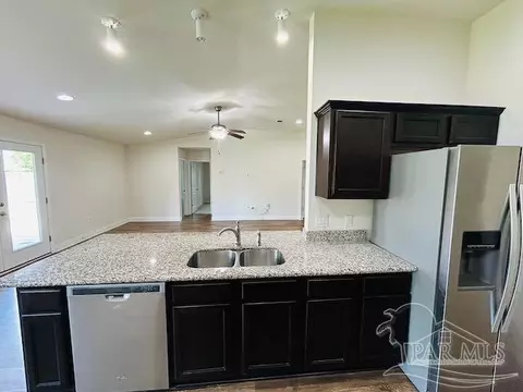 Kitchen - 5643 Flume Dr, Pace, FL 32571 photo 3 of 3