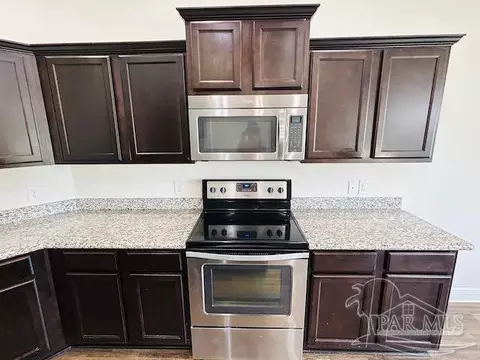 Kitchen - 5643 Flume Dr, Pace, FL 32571 photo 2 of 3
