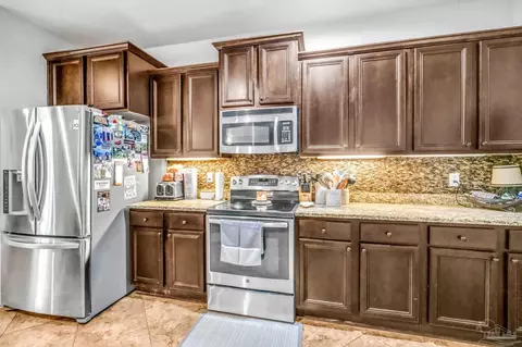 Kitchen - 2704 Wildhurst Trl, Pace, FL 32571 photo 4 of 4