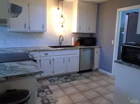 Kitchen - 7067 Pine Blossom Rd, Milton, FL 32570 photo 1 of 4