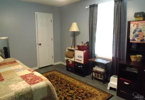 Bedroom - 7067 Pine Blossom Rd, Milton, FL 32570 photo 4 of 6