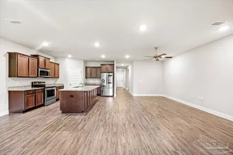 Living - 3698 Hawks Landing Cir, Pace, FL 32571 photo 5 of 7
