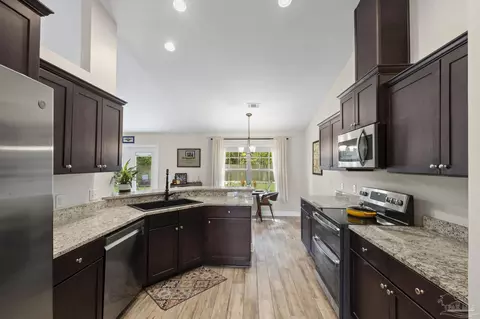 Kitchen - 6049 Autumn Pines Cir, Pace, FL 32571 photo 2 of 2