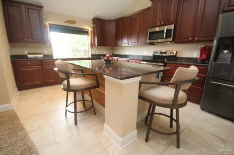 Kitchen - 6033 Stonechase Blvd, Pace, FL 32571 photo 10 of 10
