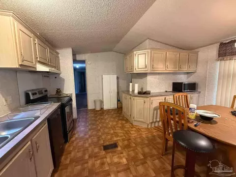 Kitchen - 7935 Custom Ct, Milton, FL 32583 photo 2 of 3
