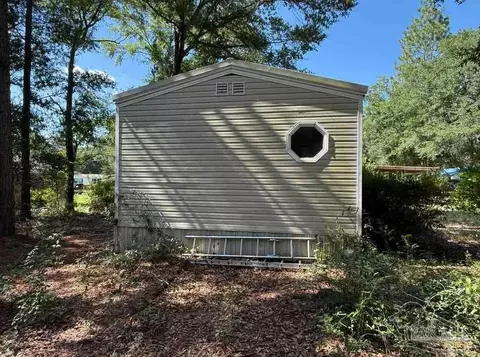 Exterior - 7935 Custom Ct, Milton, FL 32583 photo 4 of 7