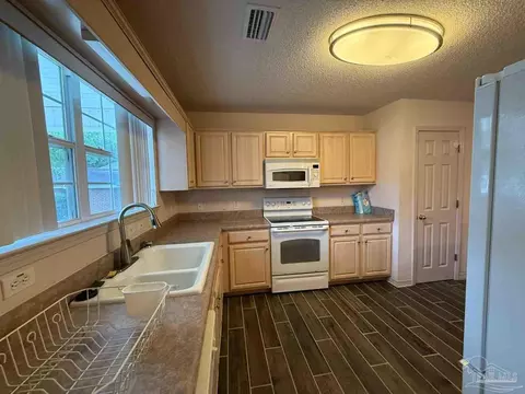 Kitchen - 4078 Jacaranda Trc, Milton, FL 32583 photo 3 of 3