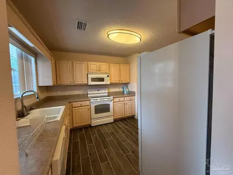 Kitchen - 4078 Jacaranda Trc, Milton, FL 32583 photo 1 of 3