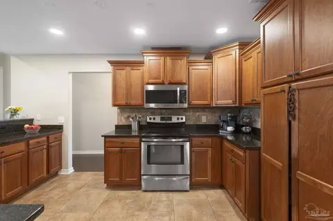 Kitchen - 5778 Dunridge Dr, Pace, FL 32571 photo 2 of 6