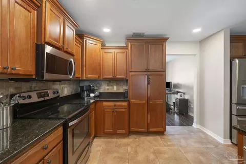 Kitchen - 5778 Dunridge Dr, Pace, FL 32571 photo 4 of 6
