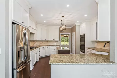 Kitchen - 2365 Bison Dr, Pace, FL 32571 photo 3 of 5