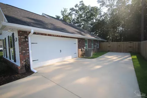 Exterior - 6130 Dollarweed Dr, Pace, FL 32571 photo 10 of 12