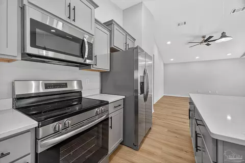 Kitchen - 5714 Pine Dr, Milton, FL 32583 photo 6 of 6