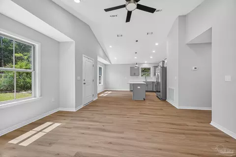 Living - 5714 Pine Dr, Milton, FL 32583 photo 2 of 6