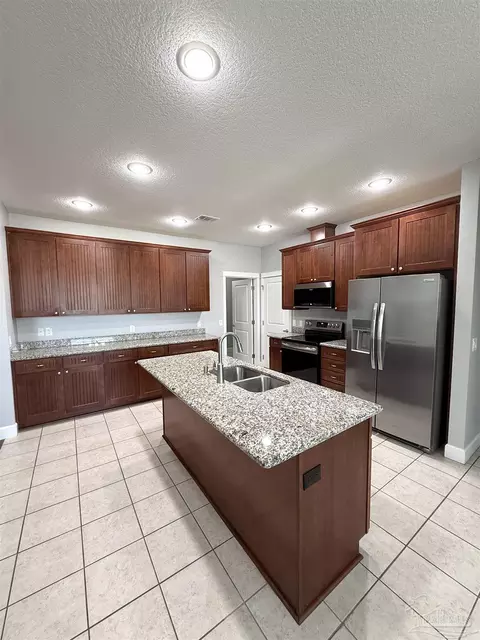 Kitchen - 1711 Brightleaf Cir, Cantonment, FL 32533 photo 2 of 7