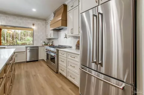 Kitchen - 9107 Pine Preserve Ln, Pace, FL 32571 photo 2 of 2
