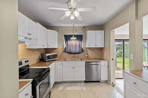 Kitchen - 203 Booth Ave, Cantonment, FL 32533 photo 2 of 2
