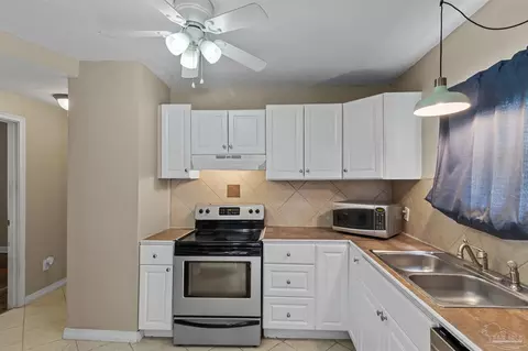 Kitchen - 203 Booth Ave, Cantonment, FL 32533 photo 1 of 2