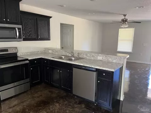 Kitchen - 5544 Hill St, Milton, FL 32570 photo 2 of 2